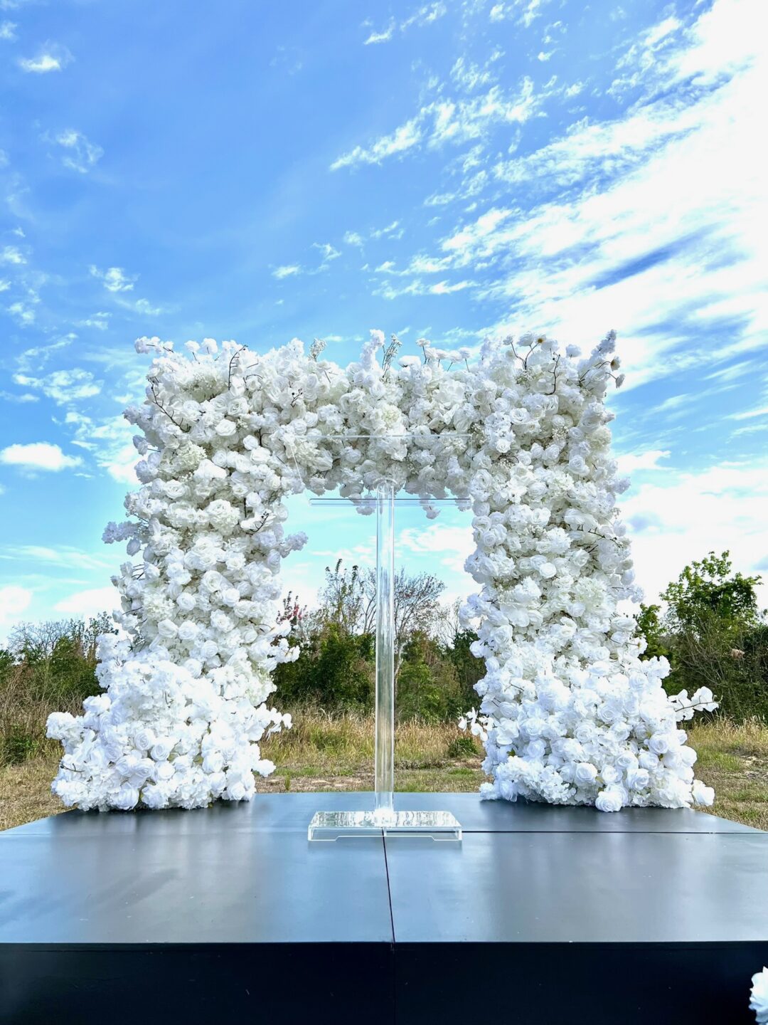 white floral arch